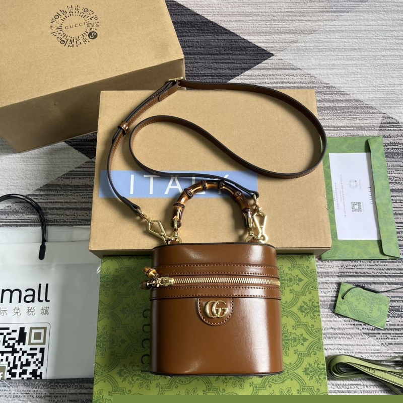 G*u*i cosmetic bags